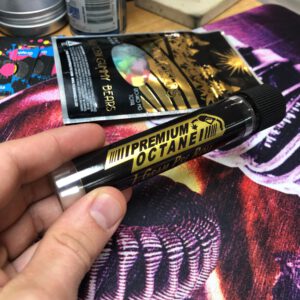 Black and metallic gold printed pre-roll tube label and packaging