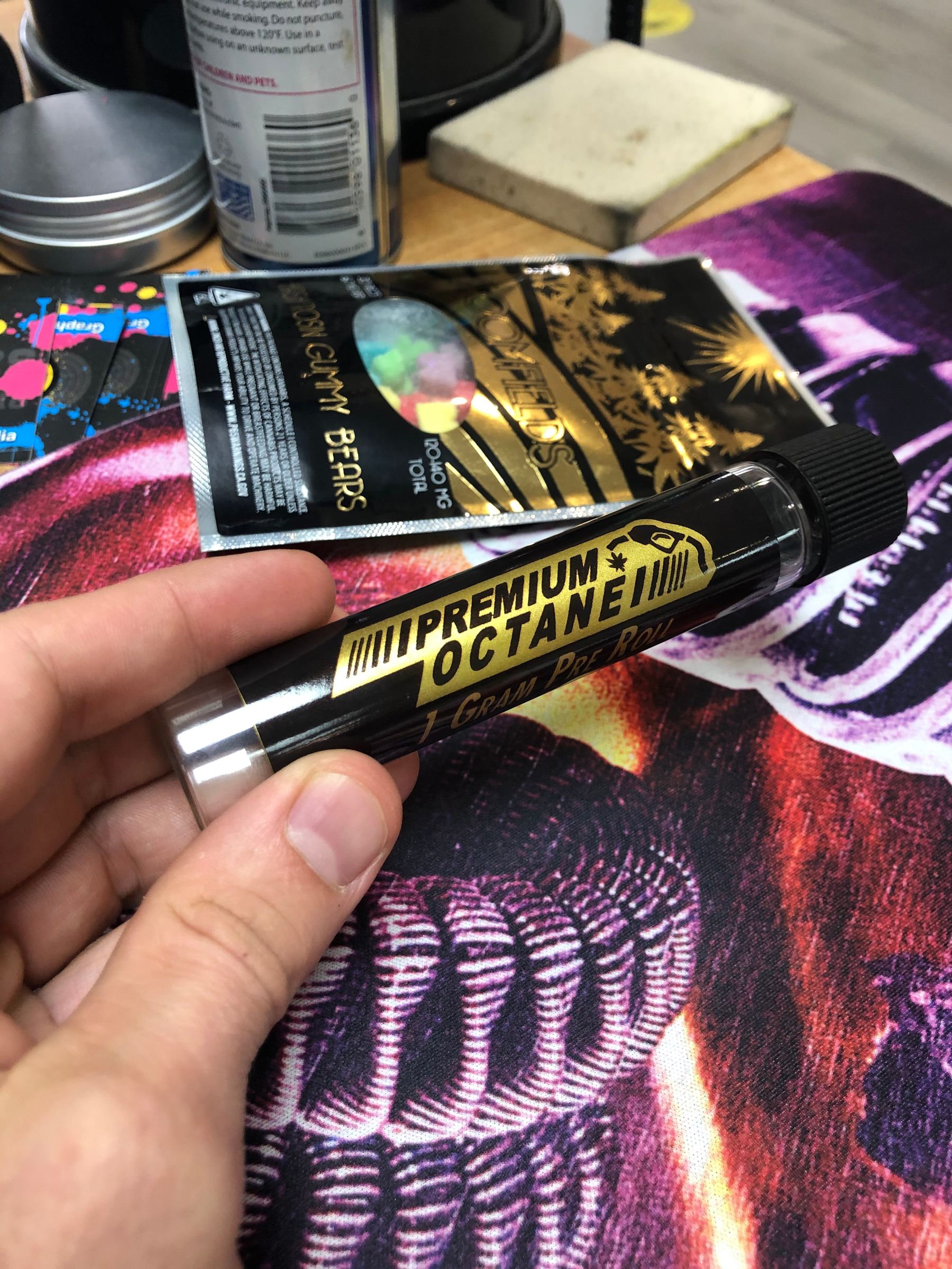 Black and metallic gold printed pre-roll tube label and packaging