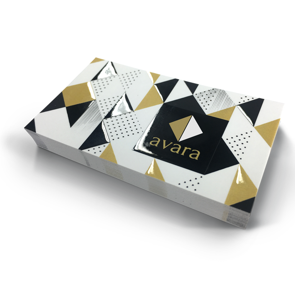 Graphics Design Media custom business cards featuring a bold gold and silver foil-stamped geometric triangle design.