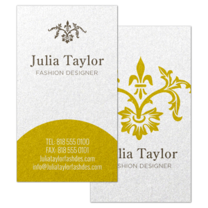 Graphics Design Media pearl metallic business card with an elegant gold foil fleur-de-lis design for a fashion designer.