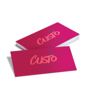 Graphics Design Media vibrant pink business cards with bold brush-script logo branding.